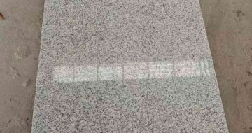 佳木斯芝麻白光面毛板