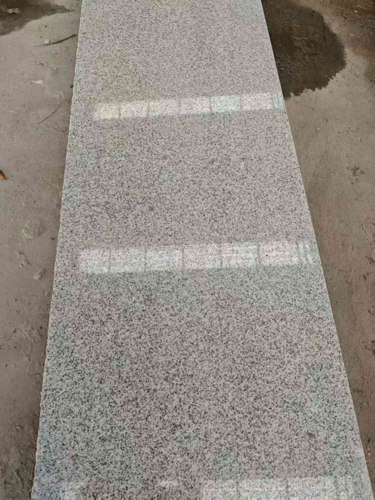 佳木斯芝麻白光面毛板